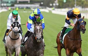 MELBOURNE, AUSTRALIA - JANUARY 16: Jye McNeil riding Housay to win Race 9, the Tab Venue Mode Handicap, during Melbourne Racing at Flemington Racecourse on January 16, 2021 in Melbourne, Australia. (Photo by Vince Caligiuri/Getty Images)