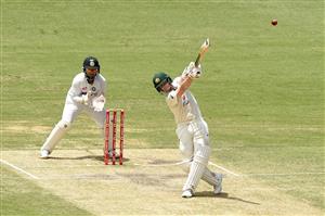 BRISBANE, AUSTRALIA - JANUARY 18: Steve Smith of Australia bats during day four of the 4th Test Match in the series between Australia and India at The Gabba on January 18, 2021 in Brisbane, Australia. (Photo by Matt Roberts/Getty Images)