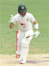 BRISBANE, AUSTRALIA - JANUARY 18: Tim Paine of Australia bats during day four of the 4th Test Match in the series between Australia and India at The Gabba on January 18, 2021 in Brisbane, Australia. (Photo by Bradley Kanaris/Getty Images)