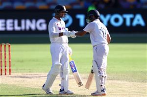 BRISBANE, AUSTRALIA - JANUARY 19: Mayank Agarwal & Rishabh Pant of India bats during day five of the 4th Test Match in the series between Australia and India at The Gabba on January 19, 2021 in Brisbane, Australia. (Photo by Matt Roberts/Getty Images)