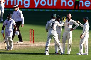 BRISBANE, AUSTRALIA - JANUARY 19: Australia celebrate the wicket of Washington Sundar of India during day five of the 4th Test Match in the series between Australia and India at The Gabba on January 19, 2021 in Brisbane, Australia. (Photo by Matt Roberts/Getty Images)