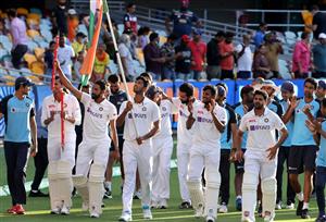 Indian players celebrate at the end of the fourth cricket Test match between Australia and India at The Gabba in Brisbane on January 19, 2021. Getty)