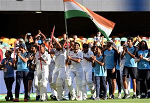 BRISBANE, AUSTRALIA - JANUARY 19: Rishabh Pant of India celebrates victory with his team mates after day five of the 4th Test Match in the series between Australia and India at The Gabba on January 19, 2021 in Brisbane, Australia. (Photo by Bradley Kanaris/Getty Images)