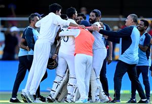 BRISBANE, AUSTRALIA - JANUARY 19: The Indian team celebrates victory after day five of the 4th Test Match in the series between Australia and India at The Gabba on January 19, 2021 in Brisbane, Australia. (Photo by Bradley Kanaris/Getty Images)