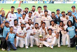 BRISBANE, AUSTRALIA - JANUARY 19: The Indian team celebrates victory after day five of the 4th Test Match in the series between Australia and India at The Gabba on January 19, 2021 in Brisbane, Australia. (Photo by Bradley Kanaris/Getty Images)