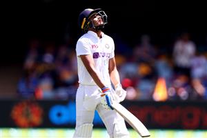 BRISBANE, AUSTRALIA - JANUARY 19: Shubman Gill of India of India walking off after being dismissed on day five of the 4th Test Match in the series between Australia and India at The Gabba on January 19, 2021 in Brisbane, Australia. (Getty)
