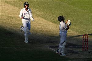 BRISBANE, AUSTRALIA - JANUARY 19: Rishabh Pant and Navdeep Saini of India celebrate victory during day five of the 4th Test Match in the series between Australia and India at The Gabba on January 19, 2021 in Brisbane, Australia. (Photo by Matt Roberts/Getty Images)