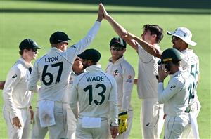 BRISBANE, AUSTRALIA - JANUARY 19: Pat Cummins of Australia celebrates taking the wicket of Mayank Agarwal of India during day five of the 4th Test Match in the series between Australia and India at The Gabba on January 19, 2021 in Brisbane, Australia. (Photo by Bradley Kanaris/Getty Images)