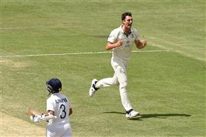 BRISBANE, AUSTRALIA - JANUARY 19: Pat Cummins of Australia celebrates taking the wicket of Ajinkya Rahane of India during day five of the 4th Test Match in the series between Australia and India at The Gabba on January 19, 2021 in Brisbane, Australia. (Photo by Matt Roberts/Getty Images)