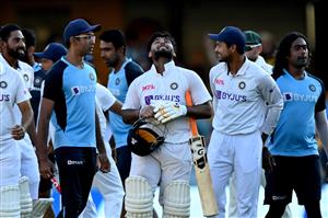 BRISBANE, AUSTRALIA - JANUARY 19: Rishabh Pant of India celebrates victory with his team mates after day five of the 4th Test Match in the series between Australia and India at The Gabba on January 19, 2021 in Brisbane, Australia. (Photo by Bradley Kanaris/Getty Images)