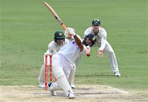 BRISBANE, AUSTRALIA - JANUARY 19: Rishabh Pant of India swings and misses as the ball races to the boundary for four byes during day five of the 4th Test Match in the series between Australia and India at The Gabba on January 19, 2021 in Brisbane, Australia. (Photo by Bradley Kanaris/Getty Images)
