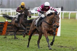 NEWBURY, ENGLAND - JANUARY 20: Ciaran Gethings riding Maskada clear the last to win The MansionBet Hurdle McHurdleface Mares' Handicap Hurdle at Newbury Racecourse on January 20, 2021 in Newbury, England. Due to the Coronavirus pandemic, owners along with the paying public will not be allowed to attend the meeting. (Photo by Alan Crowhurst/Getty Images)