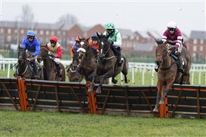 NEWBURY, ENGLAND - JANUARY 20: Ciaran Gethings riding Maskada (R) on their way to winning The MansionBet Hurdle McHurdleface Mares' Handicap Hurdle at Newbury Racecourse on January 20, 2021 in Newbury, England. Due to the Coronavirus pandemic, owners along with the paying public will not be allowed to attend the meeting. (Photo by Alan Crowhurst/Getty Images)