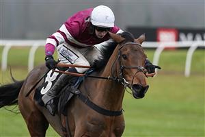 NEWBURY, ENGLAND - JANUARY 20: Ciaran Gethings riding Maskada clear the last to win The MansionBet Hurdle McHurdleface Mares' Handicap Hurdle at Newbury Racecourse on January 20, 2021 in Newbury, England. Due to the Coronavirus pandemic, owners along with the paying public will not be allowed to attend the meeting. (Photo by Alan Crowhurst/Getty Images)