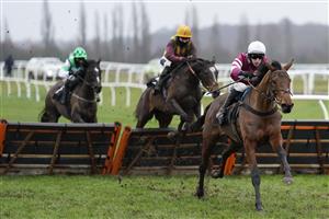 NEWBURY, ENGLAND - JANUARY 20: Ciaran Gethings riding Maskada clear the last to win The MansionBet Hurdle McHurdleface Mares' Handicap Hurdle at Newbury Racecourse on January 20, 2021 in Newbury, England. Due to the Coronavirus pandemic, owners along with the paying public will not be allowed to attend the meeting. (Photo by Alan Crowhurst/Getty Images)