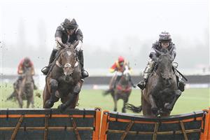 NEWBURY, ENGLAND - JANUARY 20: Nico de Boinville riding Gallyhill (L) clear the last to win The MansionBet Is Proud To Sponsor British Racing Novices' Hurdle from Jamie Moore and Robin's Dream (R) at Newbury Racecourse on January 20, 2021 in Newbury, England. Due to the Coronavirus pandemic, owners along with the paying public will not be allowed to attend the meeting. (Photo by Alan Crowhurst/Getty Images)