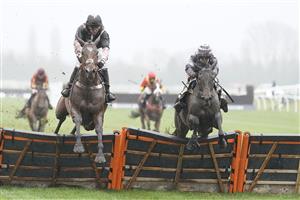 NEWBURY, ENGLAND - JANUARY 20: Nico de Boinville riding Gallyhill (L) clear the last to win The MansionBet Is Proud To Sponsor British Racing Novices' Hurdle from Jamie Moore and Robin's Dream (R) at Newbury Racecourse on January 20, 2021 in Newbury, England. Due to the Coronavirus pandemic, owners along with the paying public will not be allowed to attend the meeting. (Photo by Alan Crowhurst/Getty Images)