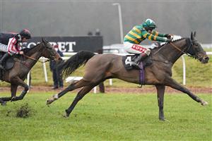 NEWBURY, ENGLAND - JANUARY 20: Richard Johnson riding Dostal Phil clear the last to win The MansionBet's Watch And Bet Novices' Limited Handicap Chase at Newbury Racecourse on January 20, 2021 in Newbury, England. Due to the Coronavirus pandemic, owners along with the paying public will not be allowed to attend the meeting. (Photo by Alan Crowhurst/Getty Images)