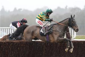 NEWBURY, ENGLAND - JANUARY 20: Richard Johnson riding Dostal Phil clear the last to win The MansionBet's Watch And Bet Novices' Limited Handicap Chase at Newbury Racecourse on January 20, 2021 in Newbury, England. Due to the Coronavirus pandemic, owners along with the paying public will not be allowed to attend the meeting. (Photo by Alan Crowhurst/Getty Images)