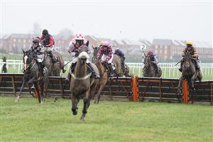 NEWBURY, ENGLAND - JANUARY 20: Richard Johnson riding Little River Bay (R) on their way to winning The British EBF Mares' 'National Hunt' Novices' Hurdle at Newbury Racecourse on January 20, 2021 in Newbury, England. Due to the Coronavirus pandemic, owners along with the paying public will not be allowed to attend the meeting. (Photo by Alan Crowhurst/Getty Images)