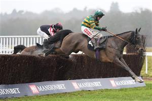NEWBURY, ENGLAND - JANUARY 20: Richard Johnson riding Dostal Phil clear the last to win The MansionBet's Watch And Bet Novices' Limited Handicap Chase at Newbury Racecourse on January 20, 2021 in Newbury, England. Due to the Coronavirus pandemic, owners along with the paying public will not be allowed to attend the meeting. (Photo by Alan Crowhurst/Getty Images)