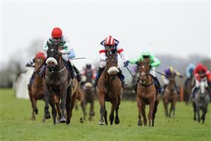 WINCANTON, ENGLAND - JANUARY 21: Aidan Coleman riding Fabrique En France (red cap) clear the last to win The Timeform Premium Ratings Available At racingtv.com 'National Hunt' Maiden Hurdle at Wincanton Racecourse on January 21, 2021 in Wincanton, England. Due to the Coronavirus pandemic, owners along with the paying public will not be allowed to attend the meeting. (Photo by Alan Crowhurst/Getty Images)