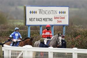 WINCANTON, ENGLAND - JANUARY 21: Runners make their way to the track for the first race at Wincanton Racecourse on January 21, 2021 in Wincanton, England. Due to the Coronavirus pandemic, owners along with the paying public will not be allowed to attend the meeting. (Photo by Alan Crowhurst/Getty Images)