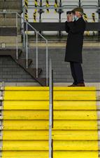 WINCANTON, ENGLAND - JANUARY 21: Watching the action at Wincanton Racecourse on January 21, 2021 in Wincanton, England. Due to the Coronavirus pandemic, owners along with the paying public will not be allowed to attend the meeting. (Photo by Alan Crowhurst/Getty Images)