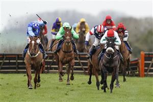 WINCANTON, ENGLAND - JANUARY 21: Aidan Coleman riding Fabrique En France (red cap) clear the last to win The Timeform Premium Ratings Available At racingtv.com 'National Hunt' Maiden Hurdle at Wincanton Racecourse on January 21, 2021 in Wincanton, England. Due to the Coronavirus pandemic, owners along with the paying public will not be allowed to attend the meeting. (Photo by Alan Crowhurst/Getty Images)