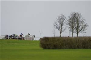 WINCANTON, ENGLAND - JANUARY 21: A general view as runners take a fence down the back straight during The Use The racingtv.com Tracker Handicap Chase at Wincanton Racecourse on January 21, 2021 in Wincanton, England. Due to the Coronavirus pandemic, owners along with the paying public will not be allowed to attend the meeting. (Photo by Alan Crowhurst/Getty Images)