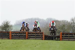 WINCANTON, ENGLAND - JANUARY 21: Aidan Coleman riding Fabrique En France (red cap) clear the last to win The Timeform Premium Ratings Available At racingtv.com 'National Hunt' Maiden Hurdle at Wincanton Racecourse on January 21, 2021 in Wincanton, England. Due to the Coronavirus pandemic, owners along with the paying public will not be allowed to attend the meeting. (Photo by Alan Crowhurst/Getty Images)
