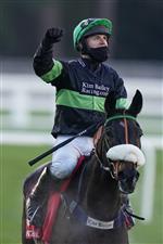 ASCOT, ENGLAND - JANUARY 23: David Bass riding First Flow celebrate after winning The Matchbook Betting Exchange Clarence House Chase at Ascot Racecourse on January 23, 2021 in Ascot, England. Due to the Coronavirus pandemic, owners along with the paying public will not be allowed to attend the meeting. (Photo by Alan Crowhurst/Getty Images)