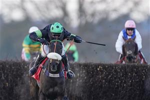 ASCOT, ENGLAND - JANUARY 23: David Bass riding First Flow clear the last to win The Matchbook Betting Exchange Clarence House Chase at Ascot Racecourse on January 23, 2021 in Ascot, England. Due to the Coronavirus pandemic, owners along with the paying public will not be allowed to attend the meeting. (Photo by Alan Crowhurst/Getty Images)