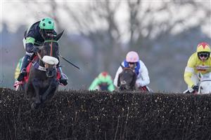 ASCOT, ENGLAND - JANUARY 23: David Bass riding First Flow (L) clear the last to win The Matchbook Betting Exchange Clarence House Chase at Ascot Racecourse on January 23, 2021 in Ascot, England. Due to the Coronavirus pandemic, owners along with the paying public will not be allowed to attend the meeting. (Photo by Alan Crowhurst/Getty Images)