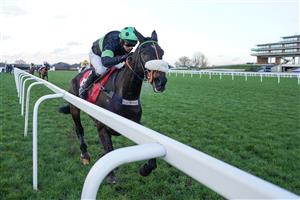 ASCOT, ENGLAND - JANUARY 23: David Bass riding First Flow clear the last to win The Matchbook Betting Exchange Clarence House Chase at Ascot Racecourse on January 23, 2021 in Ascot, England. Due to the Coronavirus pandemic, owners along with the paying public will not be allowed to attend the meeting. (Photo by Alan Crowhurst/Getty Images)