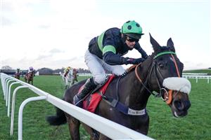 ASCOT, ENGLAND - JANUARY 23: David Bass riding First Flow clear the last to win The Matchbook Betting Exchange Clarence House Chase at Ascot Racecourse on January 23, 2021 in Ascot, England. Due to the Coronavirus pandemic, owners along with the paying public will not be allowed to attend the meeting. (Photo by Alan Crowhurst/Getty Images)