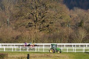 ASCOT, ENGLAND - JANUARY 23: A general view as runners approach the straight in The Matchbook Best Odds Handicap Chase at Ascot Racecourse on January 23, 2021 in Ascot, England. Due to the Coronavirus pandemic, owners along with the paying public will not be allowed to attend the meeting. (Photo by Alan Crowhurst/Getty Images)