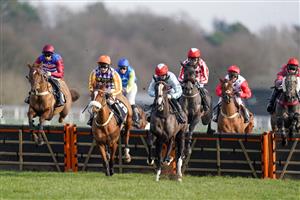 ASCOT, ENGLAND - JANUARY 23: Adrian Heskin riding Tritonic (L) on their way to winning The bet365 Juvenile Hurdle at Ascot Racecourse on January 23, 2021 in Ascot, England. Due to the Coronavirus pandemic, owners along with the paying public will not be allowed to attend the meeting. (Photo by Alan Crowhurst/Getty Images)