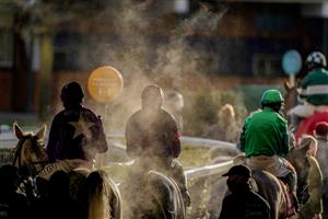 ASCOT, ENGLAND - JANUARY 23: A general view as steam rises from runners as they return from racing in The Matchbook Best Odds Handicap Chase at Ascot Racecourse on January 23, 2021 in Ascot, England. Due to the Coronavirus pandemic, owners along with the paying public will not be allowed to attend the meeting. (Photo by Alan Crowhurst/Getty Images)