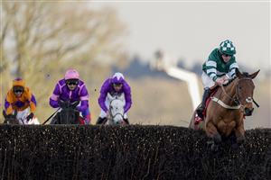 ASCOT, ENGLAND - JANUARY 23: Charlie Hammond riding Enqarde clear the last to win The Matchbook Best Odds Handicap Chase at Ascot Racecourse on January 23, 2021 in Ascot, England. Due to the Coronavirus pandemic, owners along with the paying public will not be allowed to attend the meeting. (Photo by Alan Crowhurst/Getty Images)
