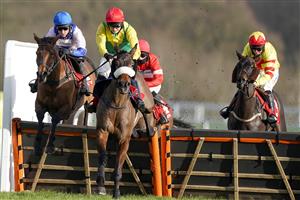 ASCOT, ENGLAND - JANUARY 23: Harry Skelton riding Roksana (pink/blue) clear the last to win The Matchbook Betting Podcast Mares' Hurdle at Ascot Racecourse on January 23, 2021 in Ascot, England. Due to the Coronavirus pandemic, owners along with the paying public will not be allowed to attend the meeting. (Photo by Alan Crowhurst/Getty Images)