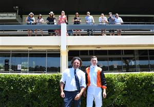 MELBOURNE, AUSTRALIA - JANUARY 23: Trainer Simon Zahra and Damian Lane pose with winning connections after Galactus won Race 2, the Thoroughbred Club Handicap, during Melbourne Racing at Sandown Racecourse on January 23, 2021 in Melbourne, Australia. Crowds have returned to the races in designated covid safe zones. (Photo by Vince Caligiuri/Getty Images)