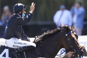 SYDNEY, AUSTRALIA - JANUARY 23: Hugh Bowman on Rocketing By returns to scale after winning race 5 the Bowermans Commercial Furniture Handicap during Sydney Racing at Royal Randwick Racecourse on January 23, 2021 in Sydney, Australia. (Photo by Mark Evans/Getty Images)