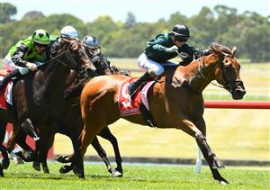 MELBOURNE, AUSTRALIA - JANUARY 23: Jamie Kah riding Second Slip to win Race 3, the Ladbrokes Back Yourself Handicap, during Melbourne Racing at Sandown Racecourse on January 23, 2021 in Melbourne, Australia. (Photo by Vince Caligiuri/Getty Images)