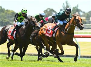 MELBOURNE, AUSTRALIA - JANUARY 23: Jamie Kah riding Second Slip to win Race 3, the Ladbrokes Back Yourself Handicap, during Melbourne Racing at Sandown Racecourse on January 23, 2021 in Melbourne, Australia. (Photo by Vince Caligiuri/Getty Images)