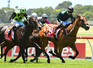 MELBOURNE, AUSTRALIA - JANUARY 23: Jamie Kah riding Second Slip to win Race 3, the Ladbrokes Back Yourself Handicap, during Melbourne Racing at Sandown Racecourse on January 23, 2021 in Melbourne, Australia. (Photo by Vince Caligiuri/Getty Images)