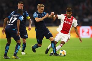 AMSTERDAM, NETHERLANDS - APRIL 23: Martin Odegaard of Vitesse battles for the ball with David Neres of Ajax during the Eredivisie match between Ajax and Vitesse at Johan Cruyff Arena on April 23, 2019 in Amsterdam, Netherlands. (Photo by Dean Mouhtaropoulos/Getty Images)
