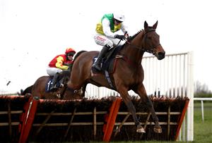 DONCASTER, ENGLAND - JANUARY 29: Sam Barton ridden by Adam Wedge clears a fence on their way to winning the Sporting Life EBF 'National Hunt' Maiden Hurdle at Doncaster Racecourse on January 29, 2021 in Doncaster, England. (Photo by Tim Goode - Pool/Getty Images)