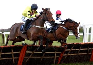 DONCASTER, ENGLAND - JANUARY 29: Her Indoors ridden by Adrian Heskin (left) clears a fence on their way to winning the Sky Bet Fillies' Juvenile Hurdle (Listed) at Doncaster Racecourse on January 29, 2021 in Doncaster, England. (Photo by Tim Goode - Pool/Getty Images)