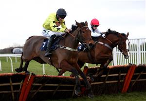 DONCASTER, ENGLAND - JANUARY 29: Her Indoors ridden by Adrian Heskin (left) clears a fence on their way to winning the Sky Bet Fillies' Juvenile Hurdle (Listed) at Doncaster Racecourse on January 29, 2021 in Doncaster, England. (Photo by Tim Goode - Pool/Getty Images)